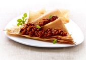 Filo dough triangle with dried tomato spread